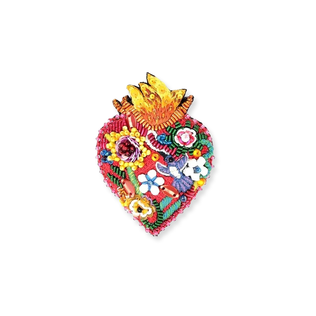 Colorful heart-shaped decorative item with floral designs on a white background