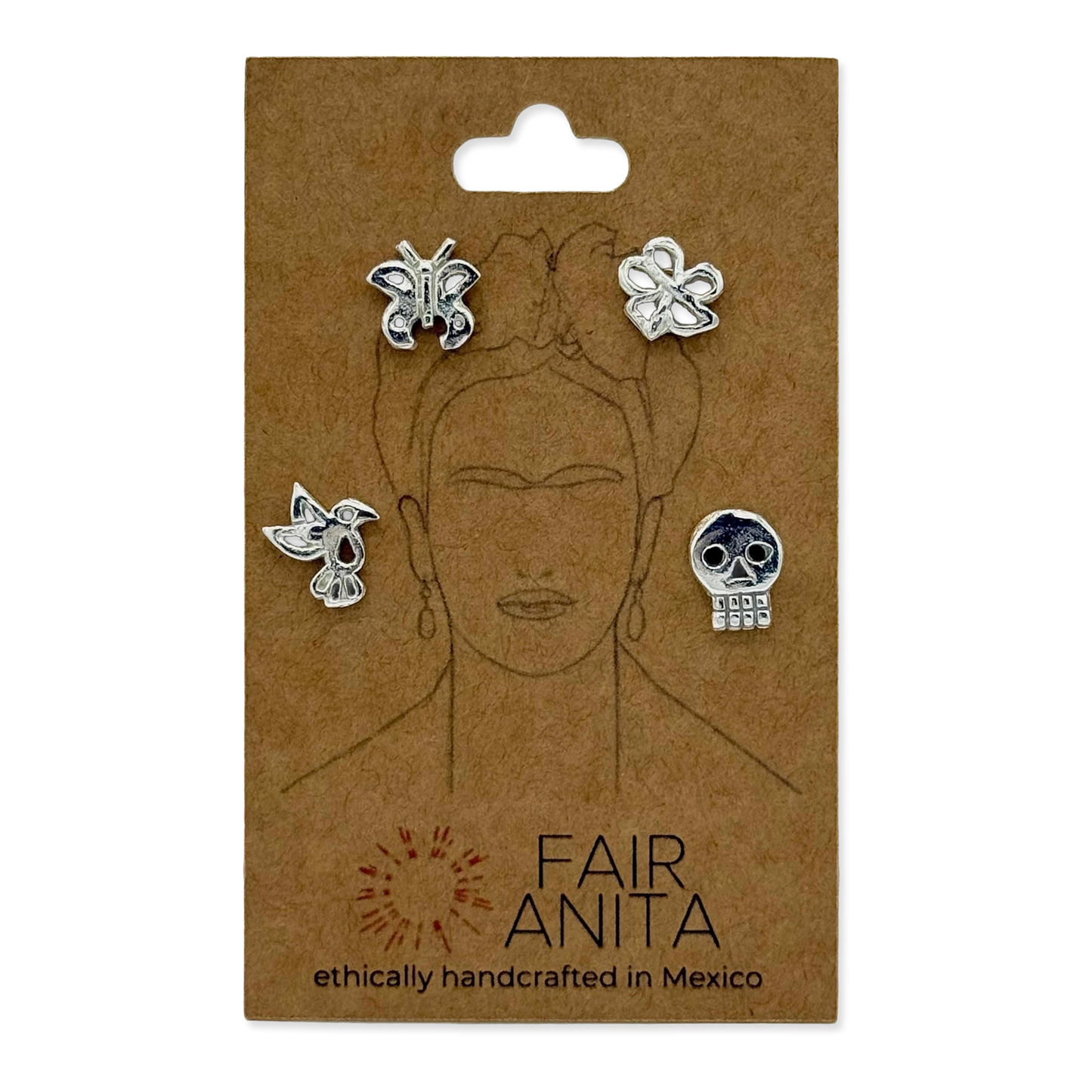 Package with Frida Kahlo image and four different silver earrings.