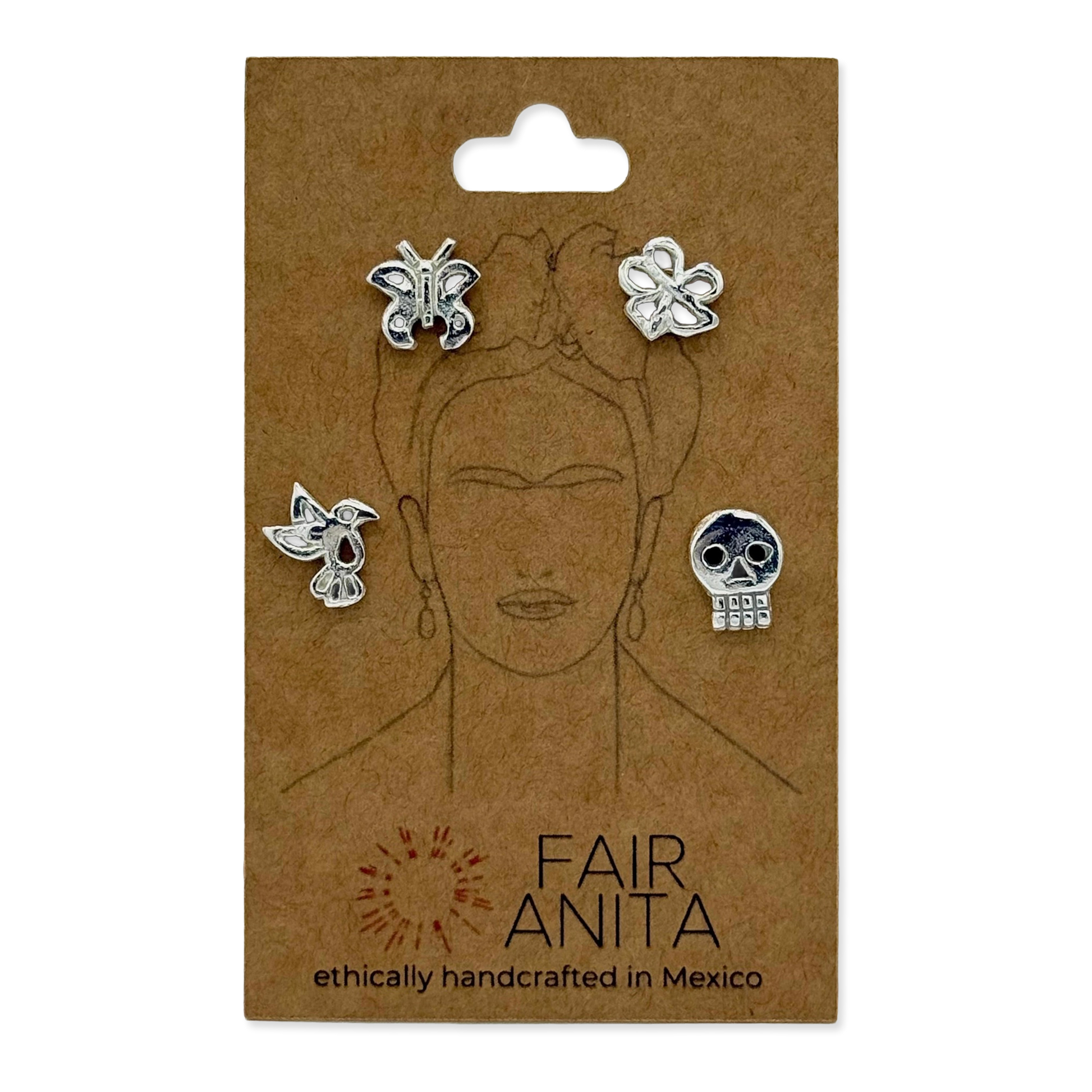 Package with Frida Kahlo image and four different silver earrings.