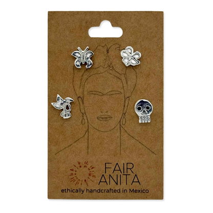 Package with Frida Kahlo image and four different silver earrings.