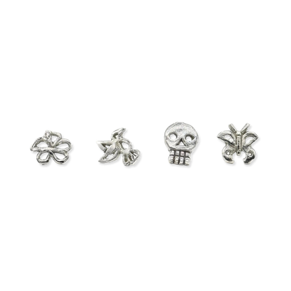 Tiny silver stud earrings: flower, bird, skull, butterfly