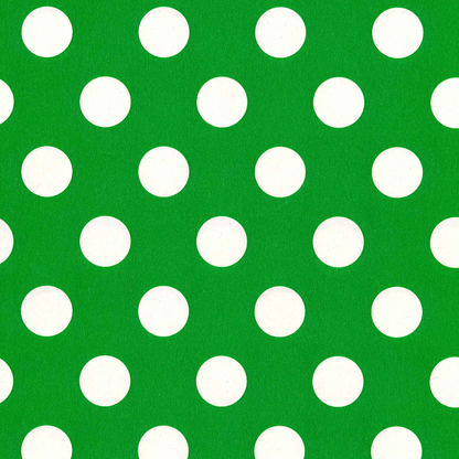Green background with white polka dots