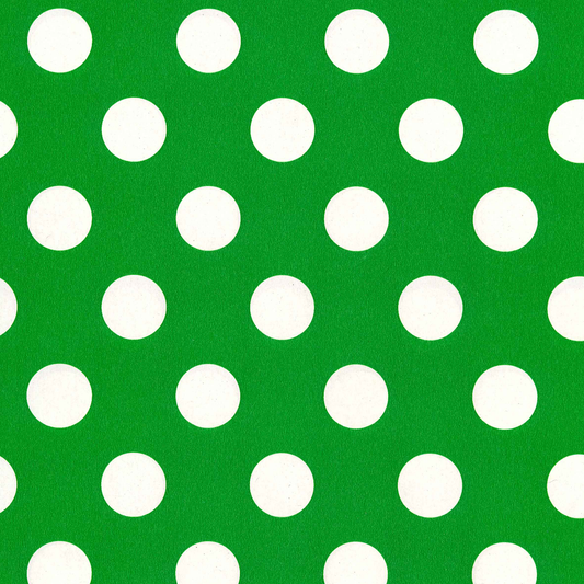 Green background with white polka dots