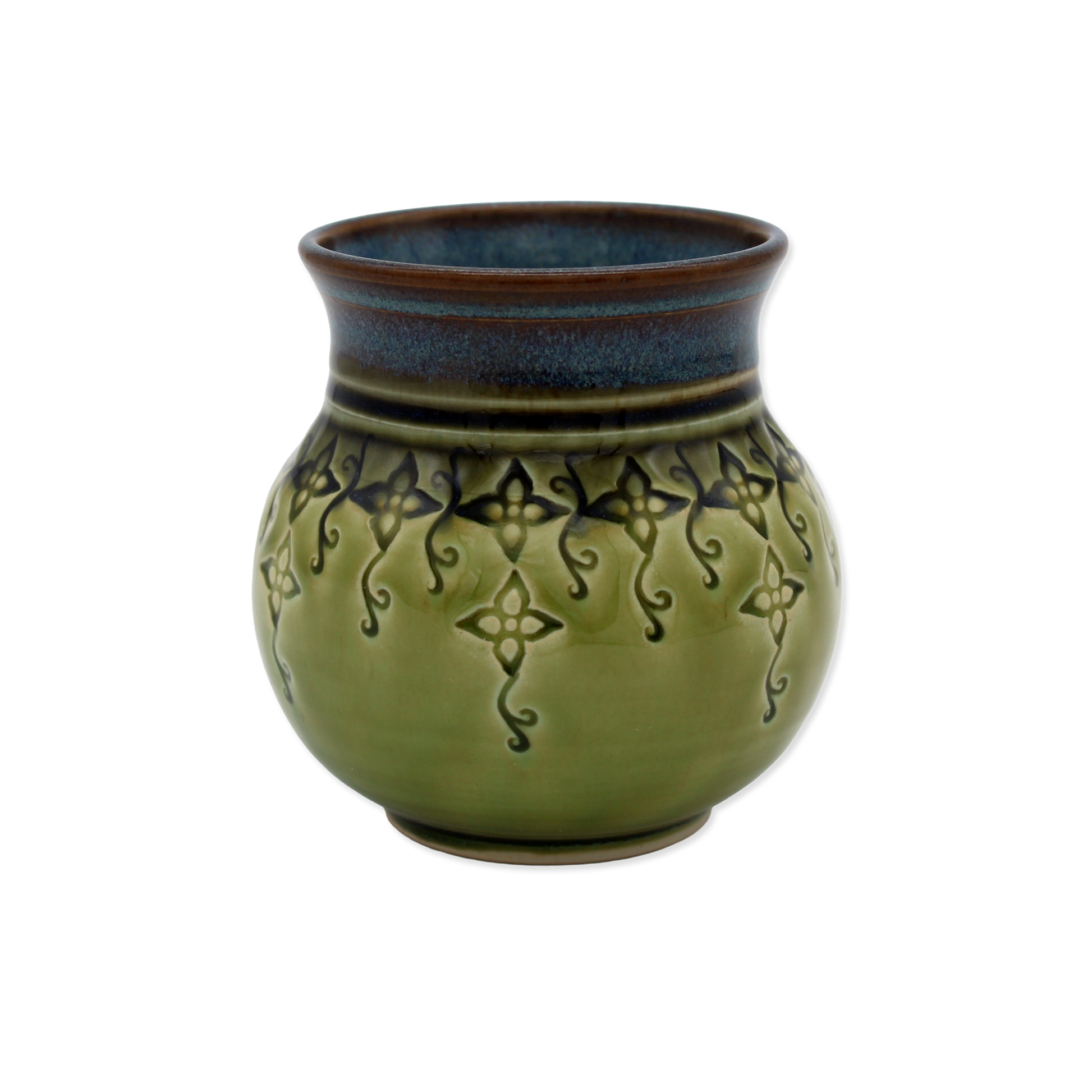 Green ceramic vase with decorative patterns on a white background