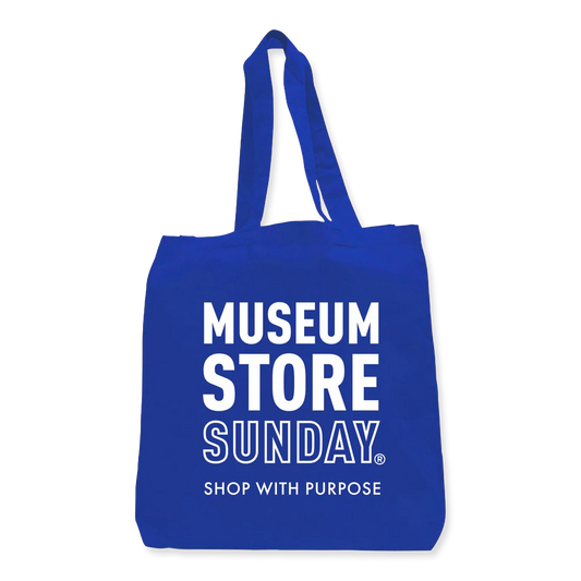 Blue tote bag with 'Museum Store Sunday' text on a white background