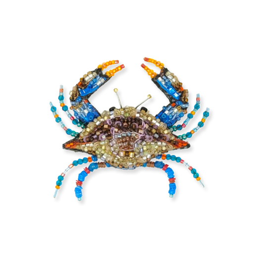 Decorative crab made of beads on a white background