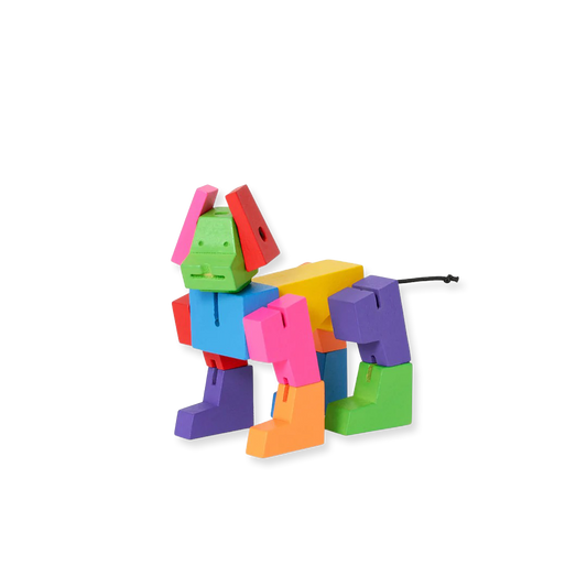 Colorful toy dog figure made of interlocking blocks on a white background