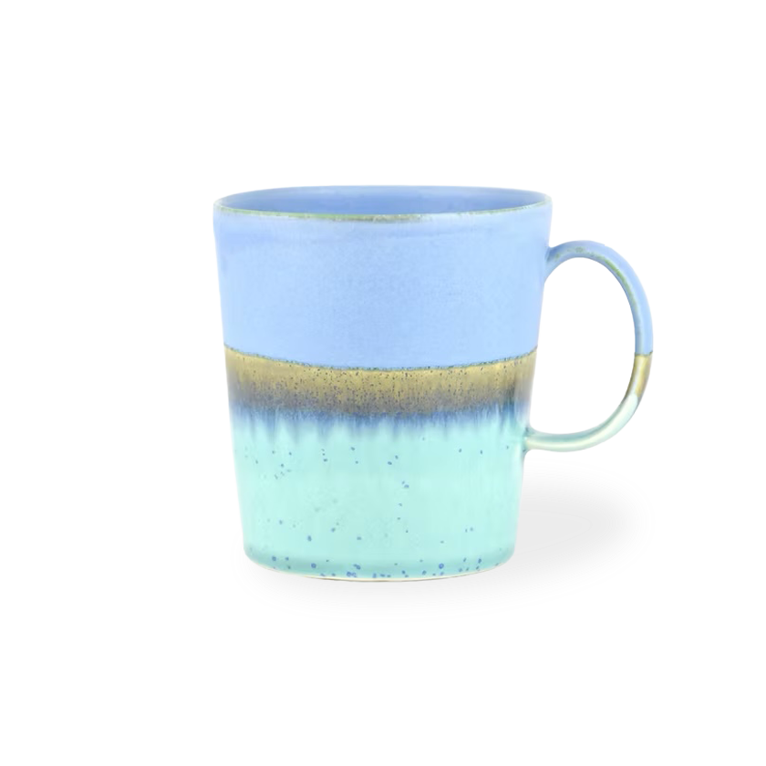 Blue and green ceramic mug on a white background