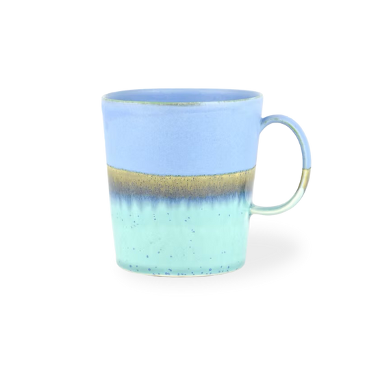 Blue and green ceramic mug on a white background