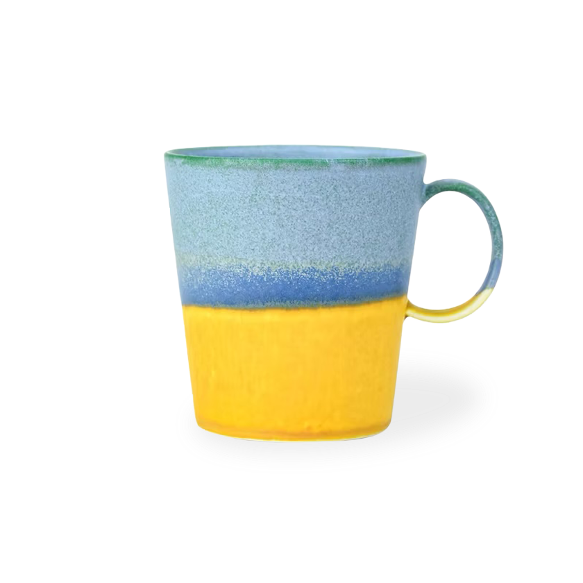 Colorful mug with blue and yellow gradient on a white background