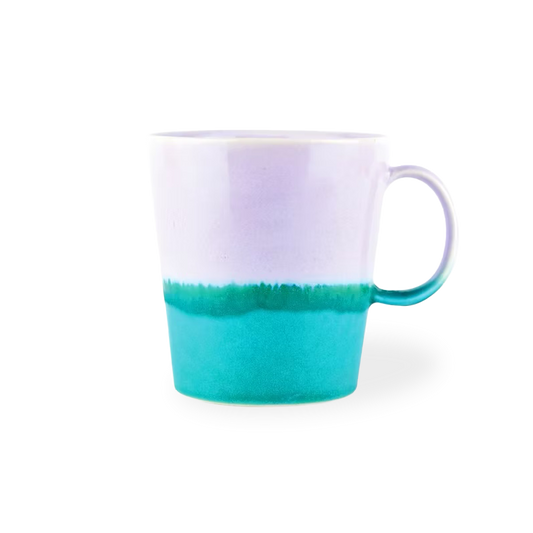 Mug with gradient design from white to teal on a white background