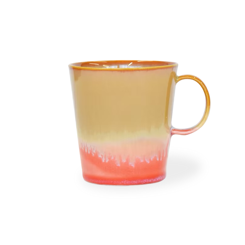 Mug with gradient color from yellow to red on a white background
