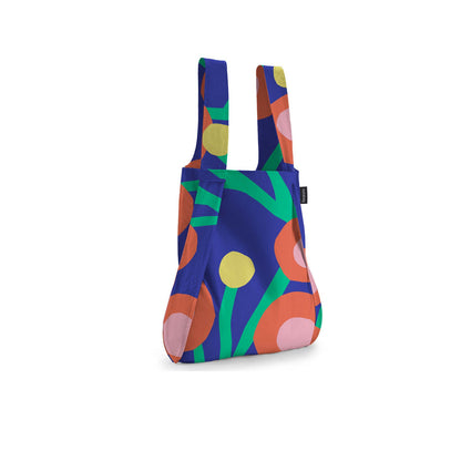 Colorful patterned bag on a white background