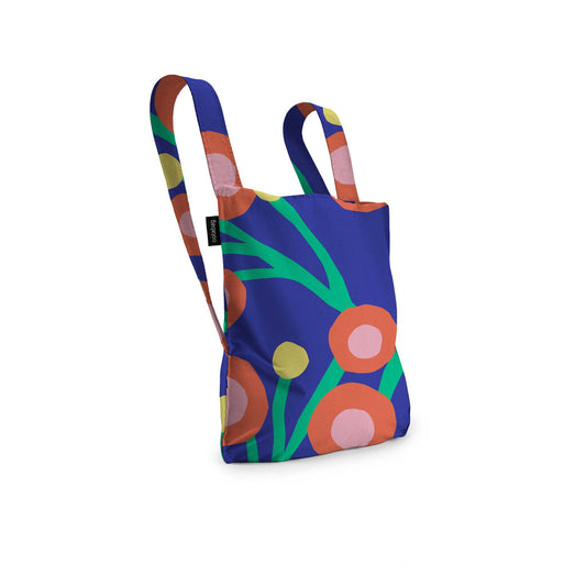 Colorful backpack with abstract design on a white background
