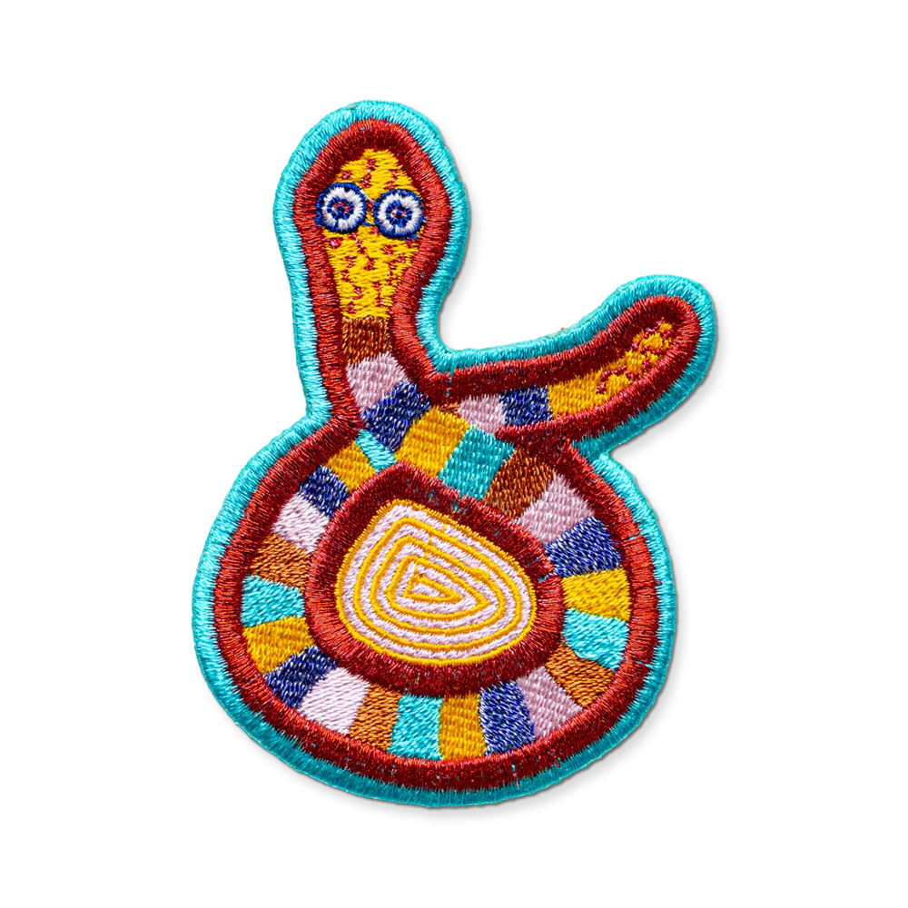 Colorful embroidered patch with abstract design on a white background