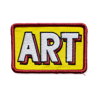 Patch with 'ART' text on a yellow background