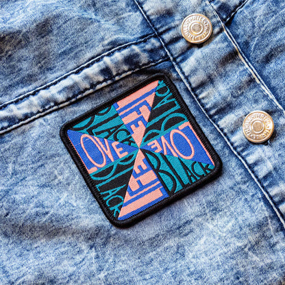 Love Black Life Iron-on Patch by Faith Ringgold