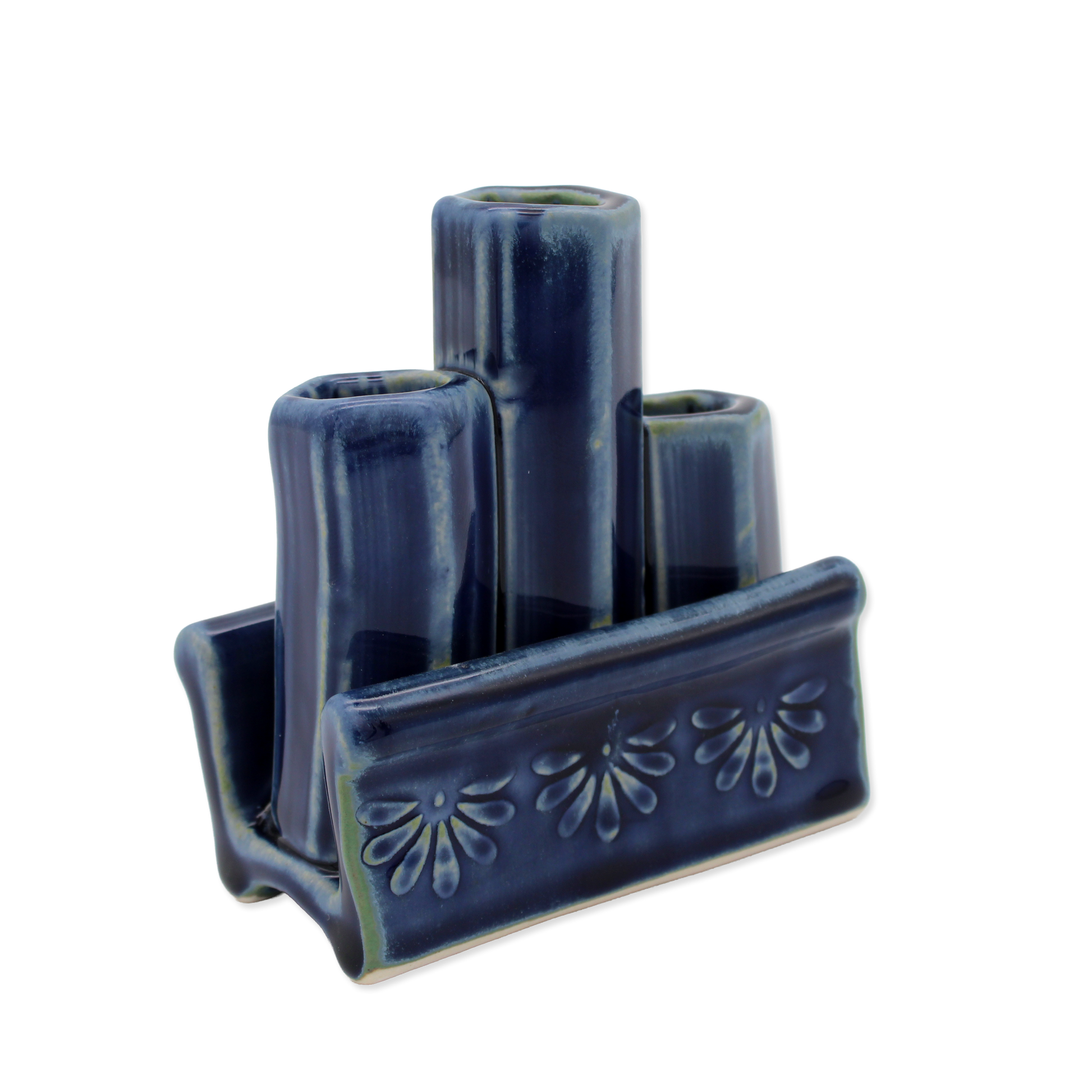 Blue ceramic vase holder with three cylindrical compartments on a white background