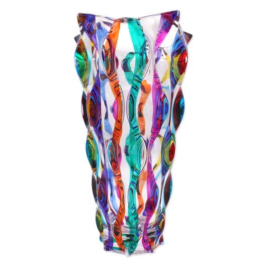 Colorful glass vase with wavy pattern on a white background