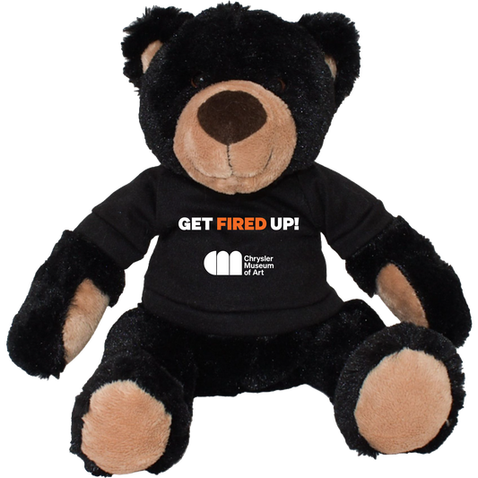 Rufus, the black teddy bear wearing his Chrysler Museum Glass Studio "Get Fired Up!" T-shirt - Chrysler Shop