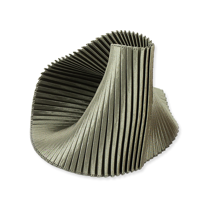 Green pleated decorative item on a white background