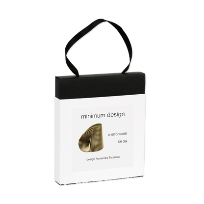 White packaging box with black handle featuring 'minimum design' and a shell bracelet illustration.
