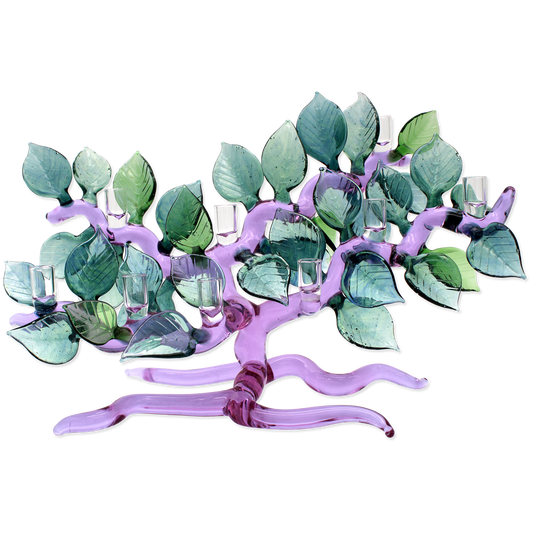 Decorative Menorah shaped like a tree with green leaves and purple branches on a white background