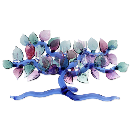 Decorative candle holder with colorful leaf-like designs on a white background