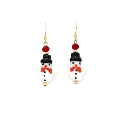 Pair of glass earrings with snow person design, with black hat and red scarf