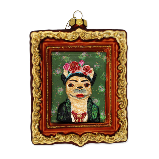 Decorative ornament with a stylized portrait of a dog in a decorative frame on a white background