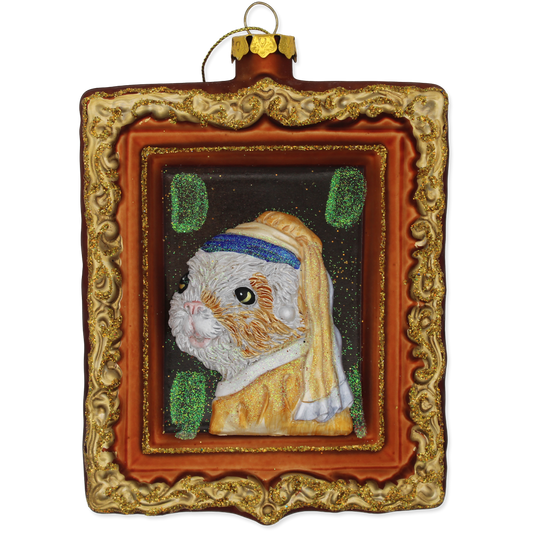Decorative ornament with a dog in a gold frame on a white background