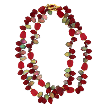 Necklace with red and multicolored beads on a white background