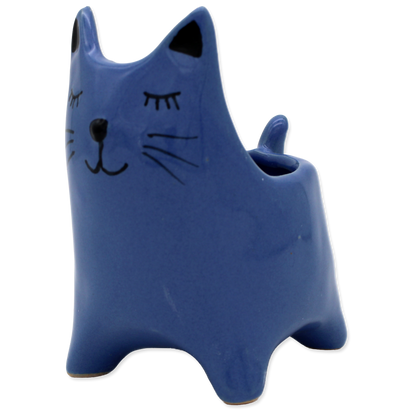 Blue cat-shaped ceramic planter on a white background