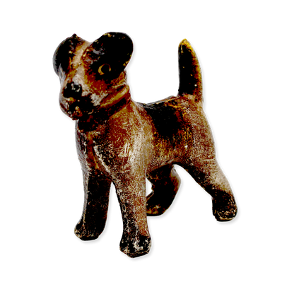 Vintage-style toy dog figure on a white background
