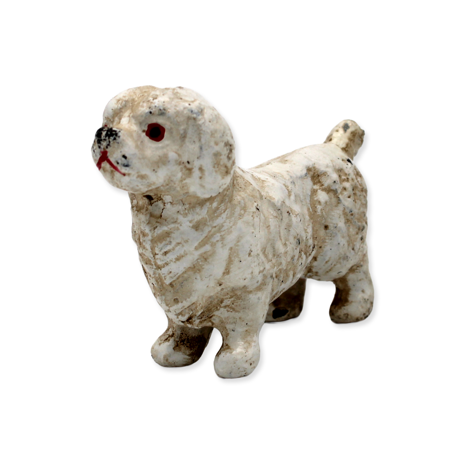 Vintage cast iron white Maltese dog figurine on a white background