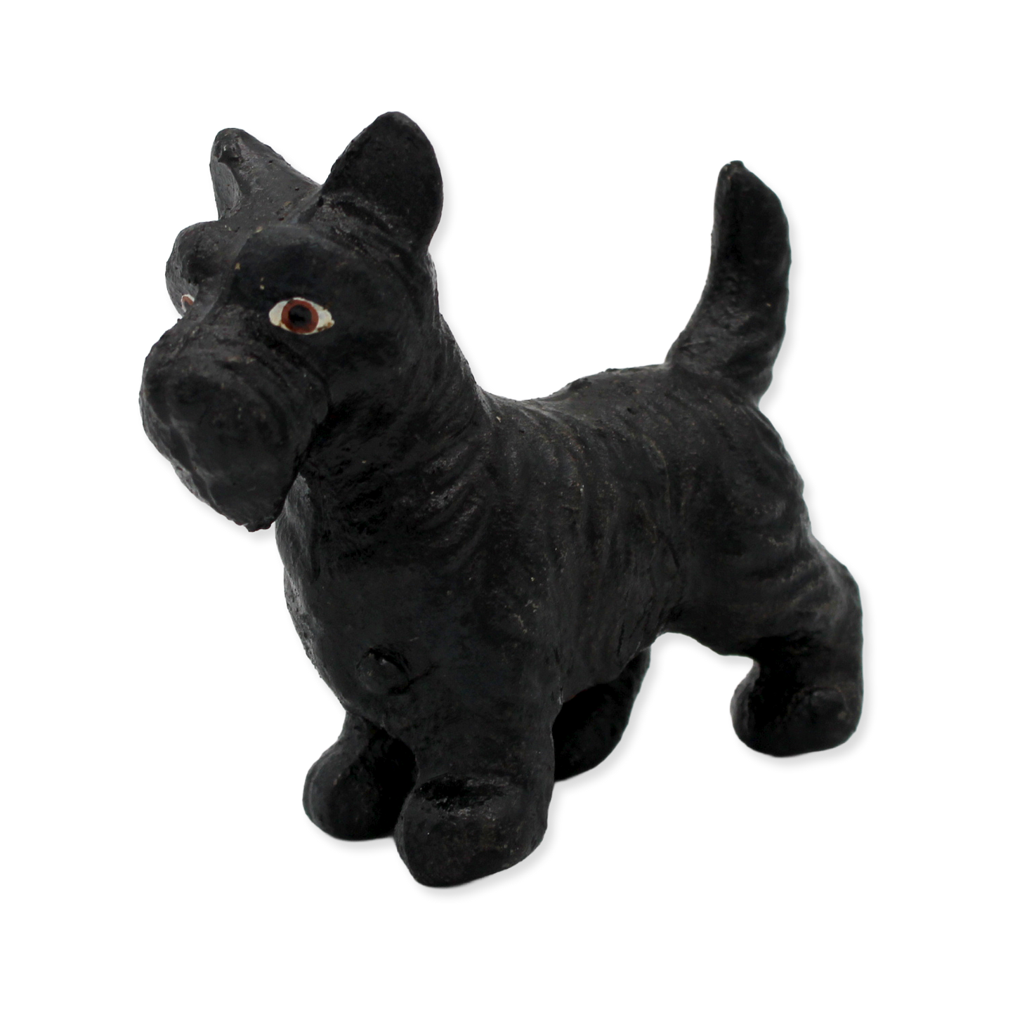 Black Scottie dog figurine on a white background