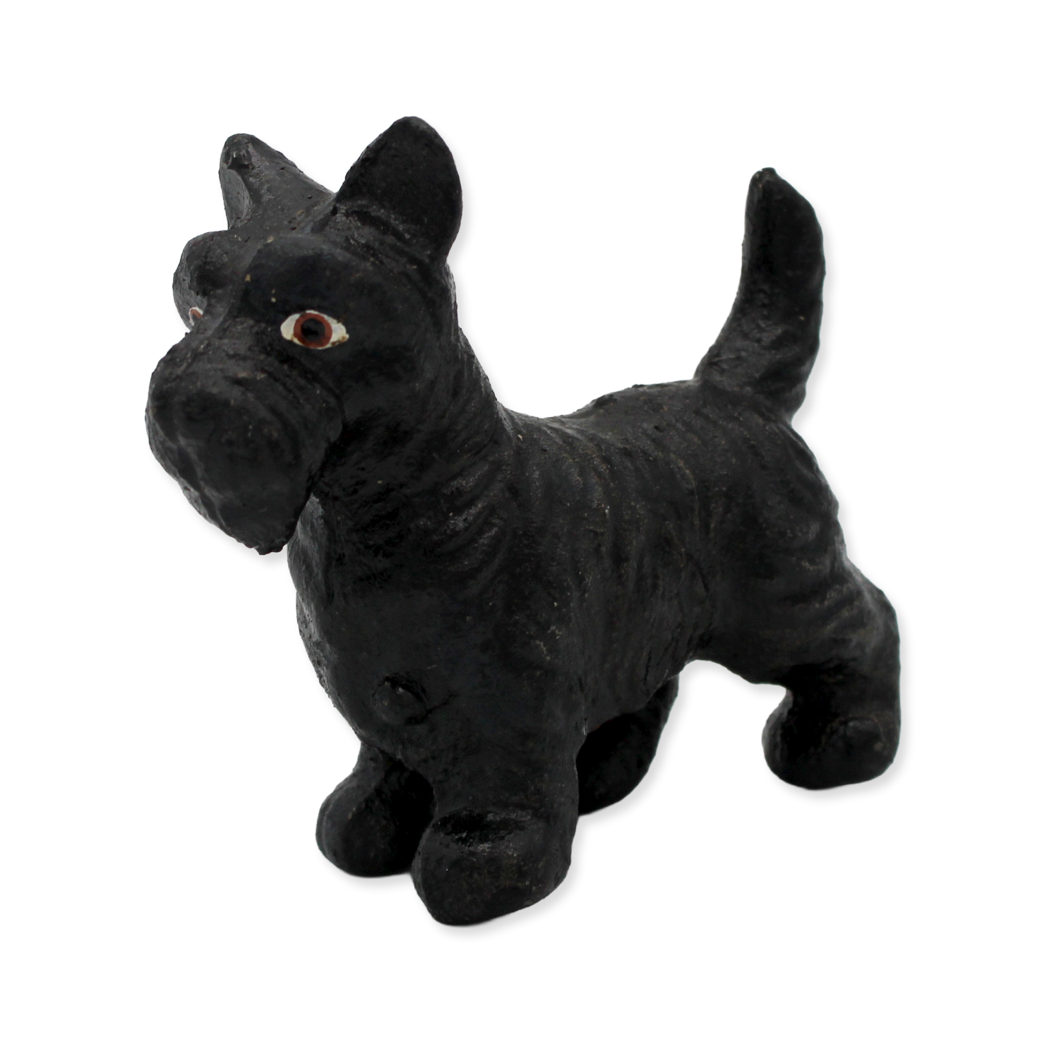Black Scottie dog figurine on a white background
