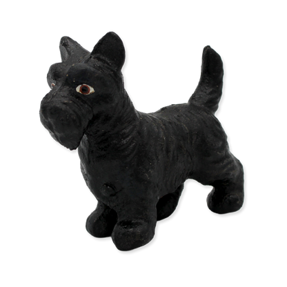 Black Scottie dog figurine on a white background