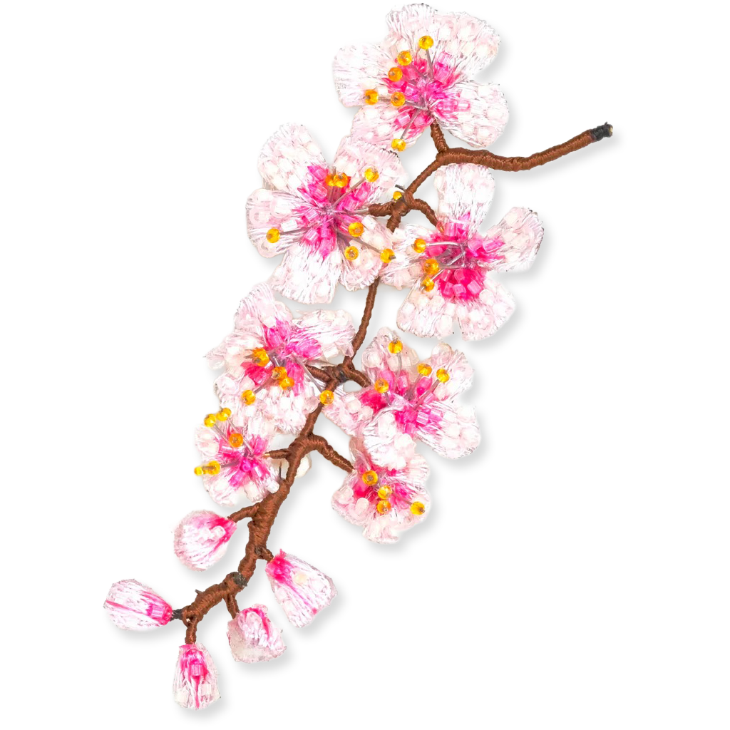 Decorative branch with pink and white flowers on a white background