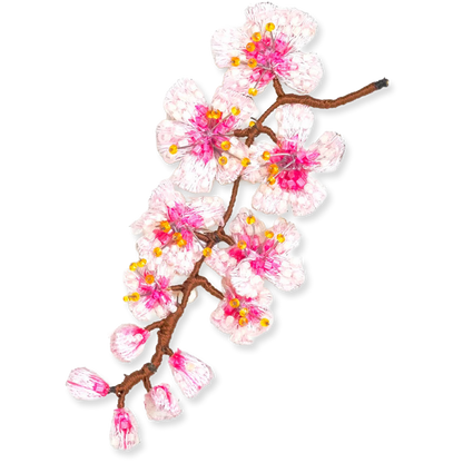 Decorative branch with pink and white flowers on a white background