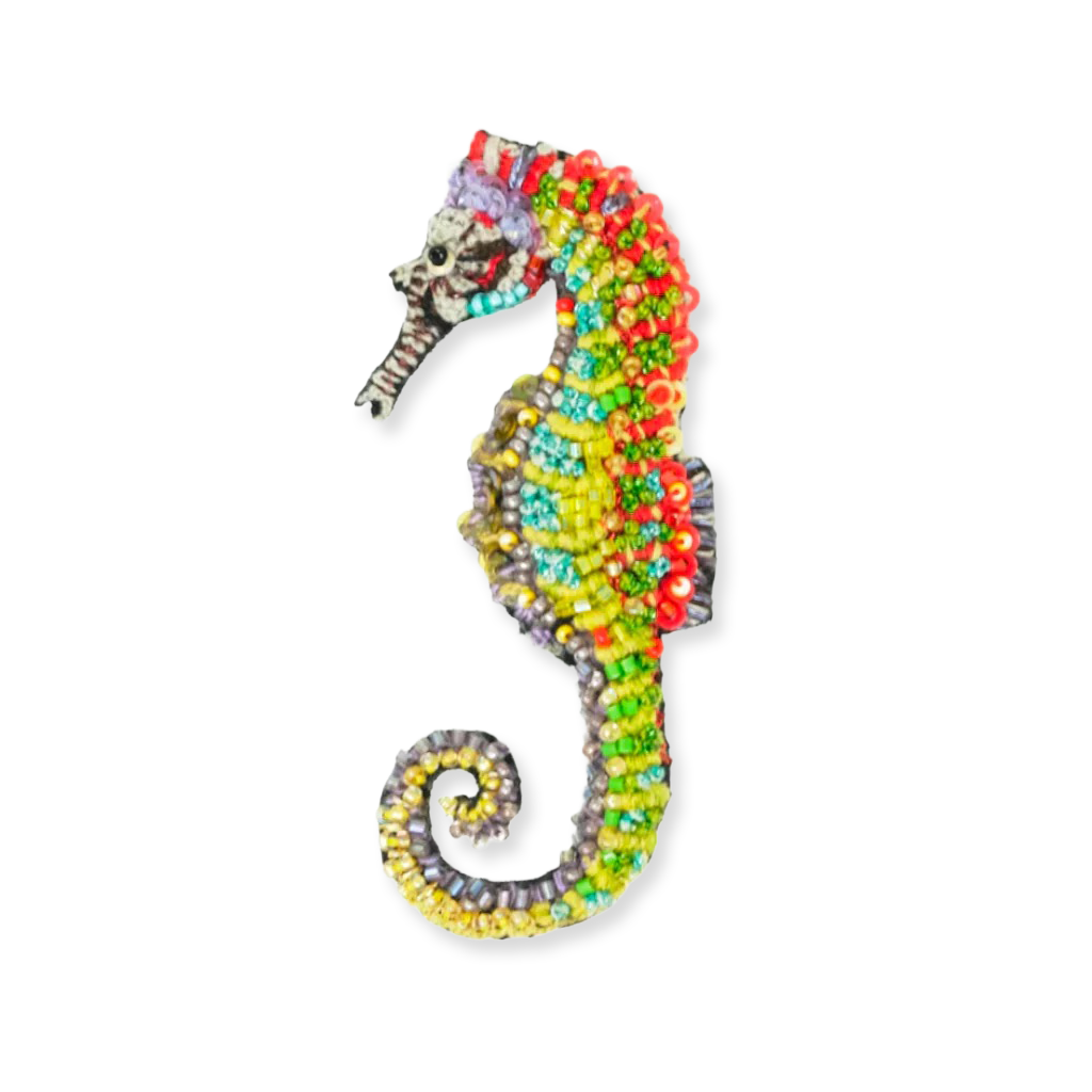 Colorful beaded seahorse on a white background