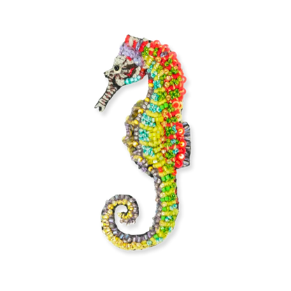 Colorful beaded seahorse on a white background