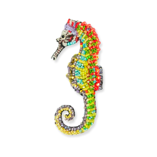 Colorful beaded seahorse on a white background
