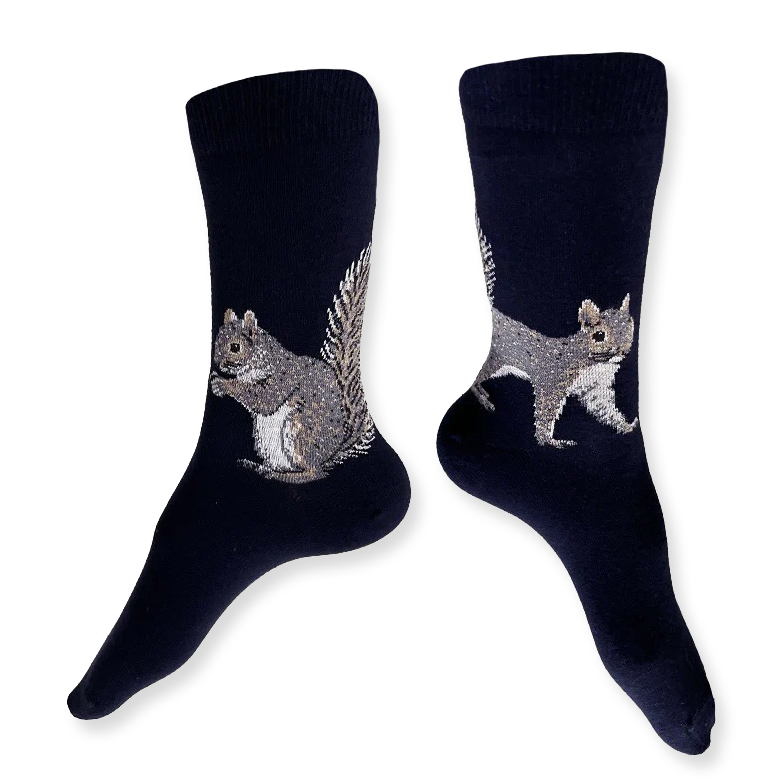 Pair of navy socks with squirrel design on a white background