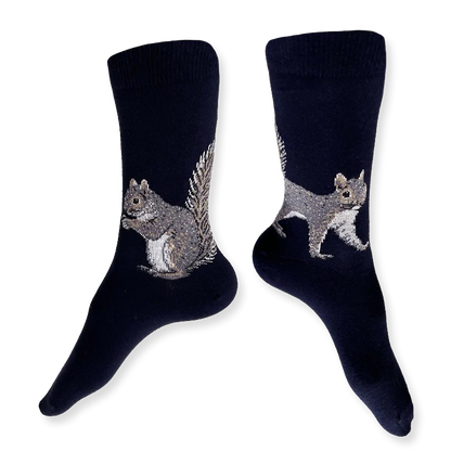 Pair of navy socks with squirrel design on a white background