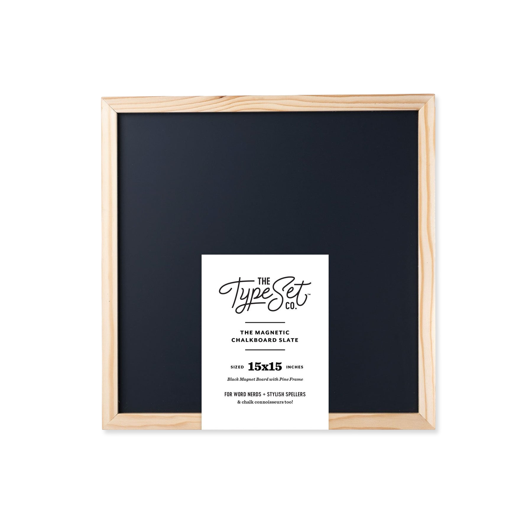 Framed black chalkboard with a white label on a white background