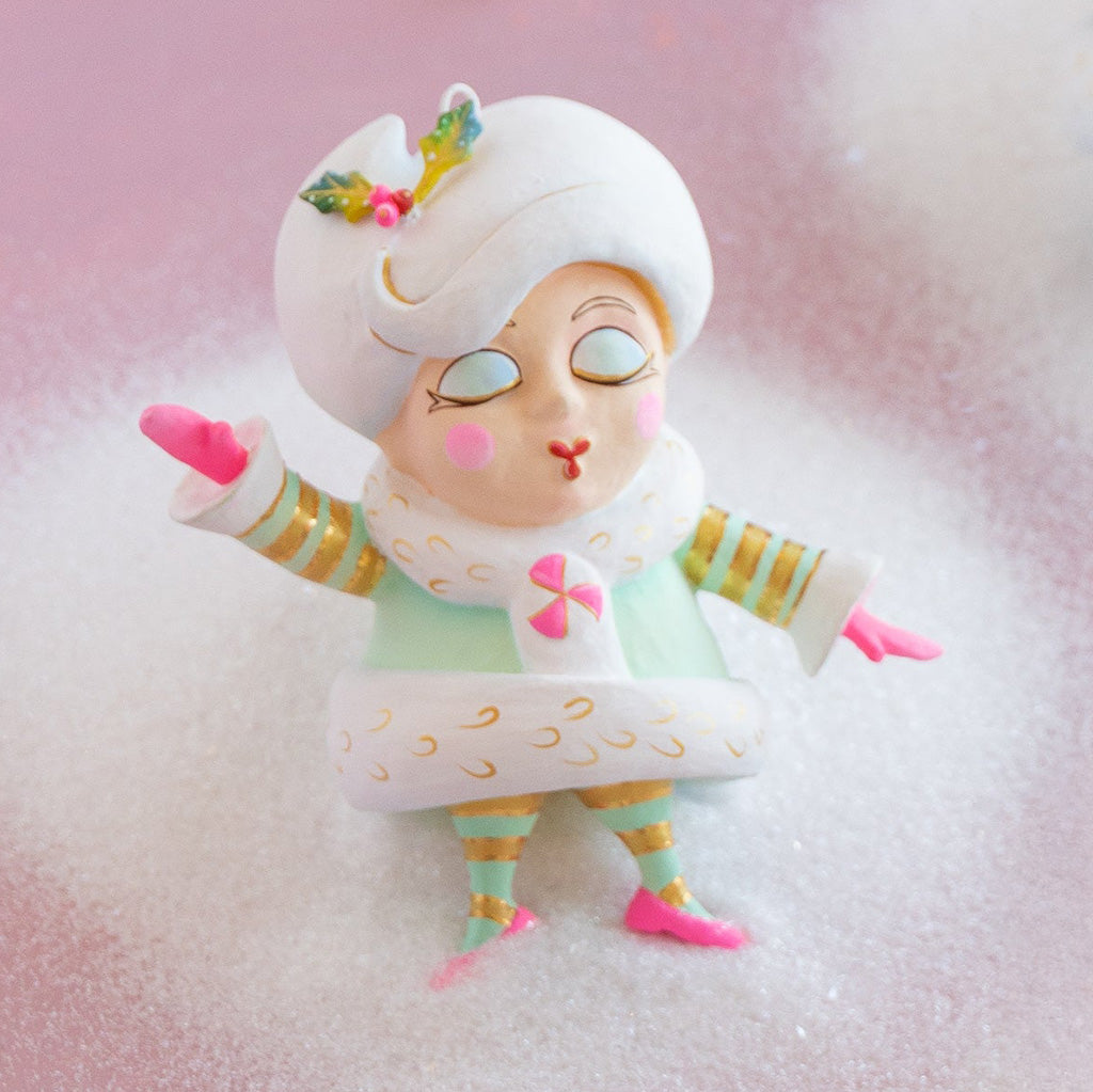 Colorful ornament with a soft pink background