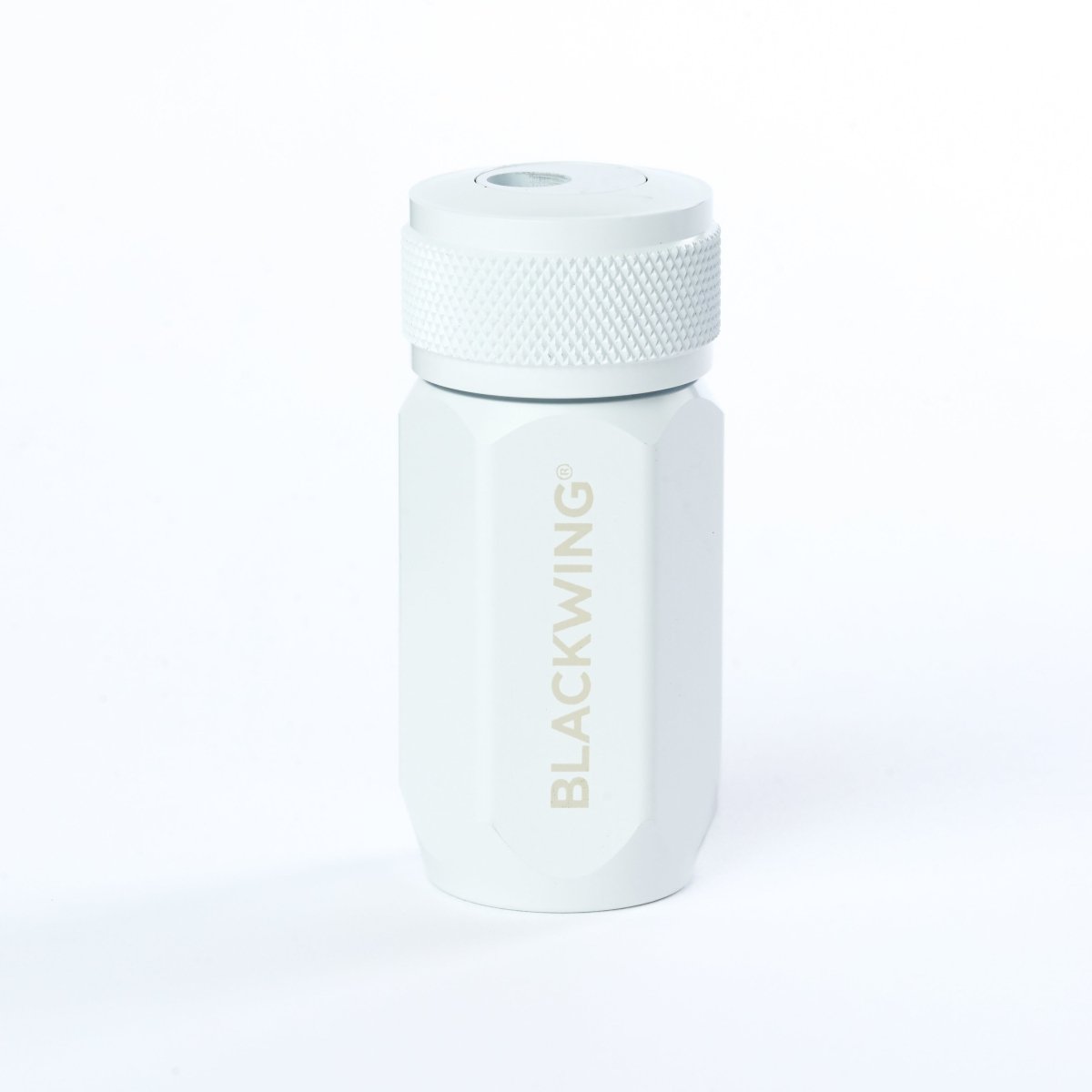 White pencil sharpener with 'Blackwing' branding on a white background