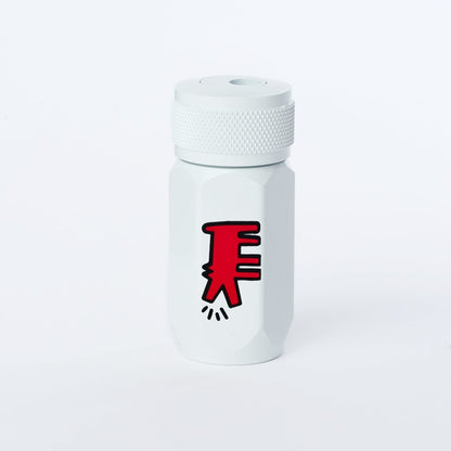 White pencil sharpener with red and black logo on a white background