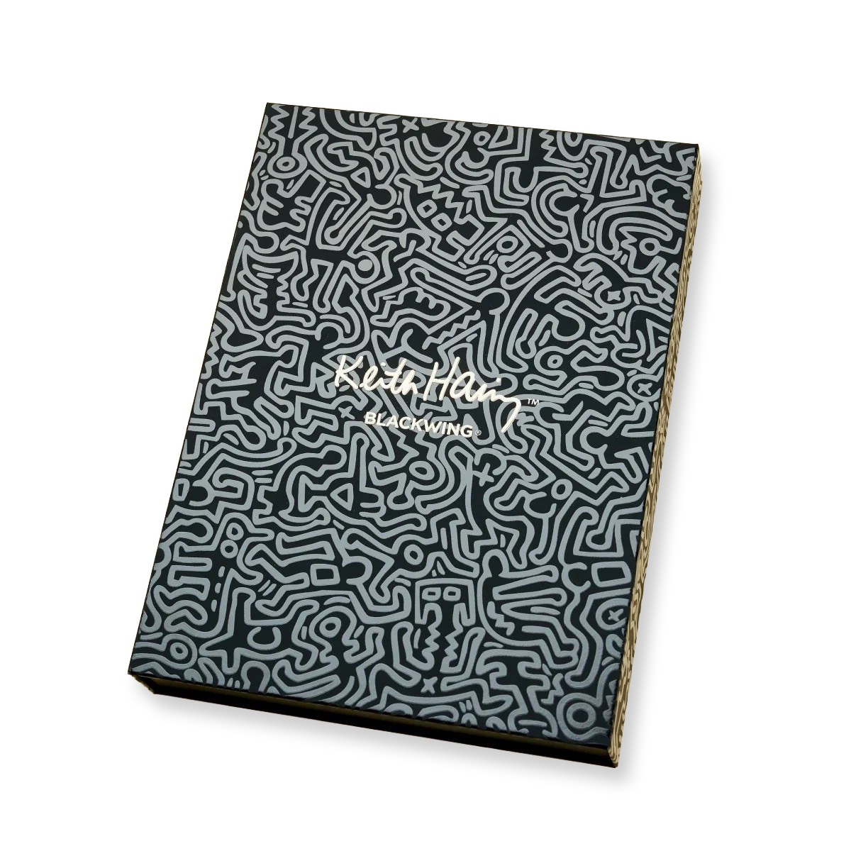 Notebook with a black and white patterned cover on a white background